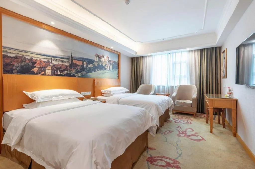 Bed in Vienna Hotel Changsha Wuyi Avenue Railway Station