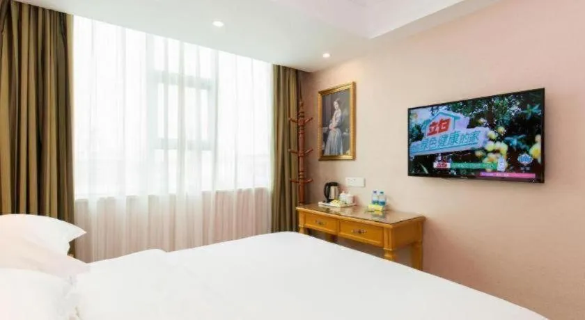 Bed in Vienna Hotel Changsha Wuyi Avenue Railway Station