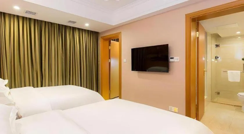 Bed in Vienna Hotel Changsha Wuyi Avenue Railway Station