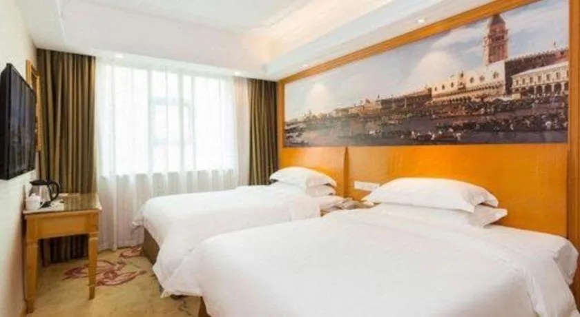 Bed in Vienna Hotel Changsha Wuyi Avenue Railway Station