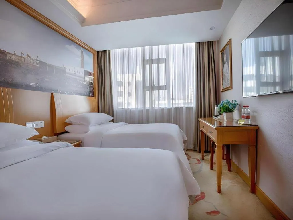 Bed in Vienna Hotel Changsha Wuyi Avenue Railway Station