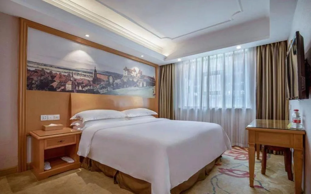 Bed in Vienna Hotel Changsha Wuyi Avenue Railway Station