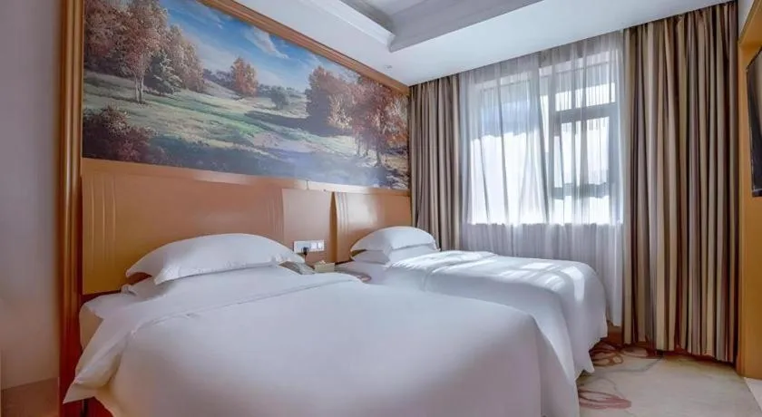 Bed in Vienna Hotel Changsha Wuyi Avenue Railway Station