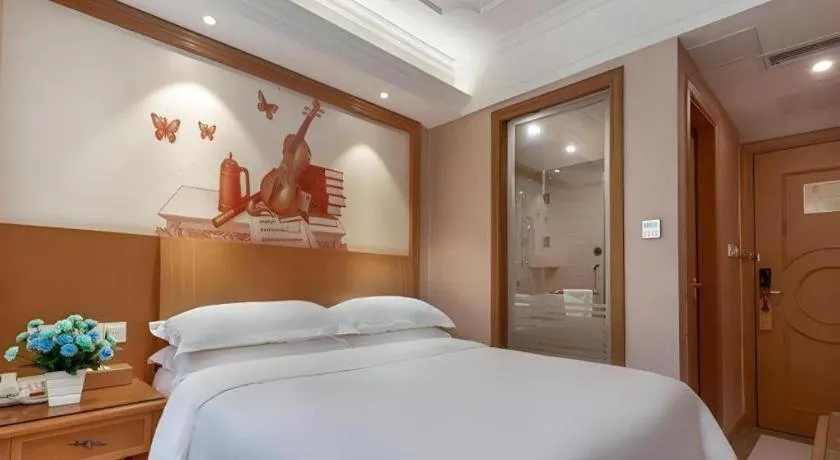 Bed in Vienna Hotel Changsha Wuyi Avenue Railway Station