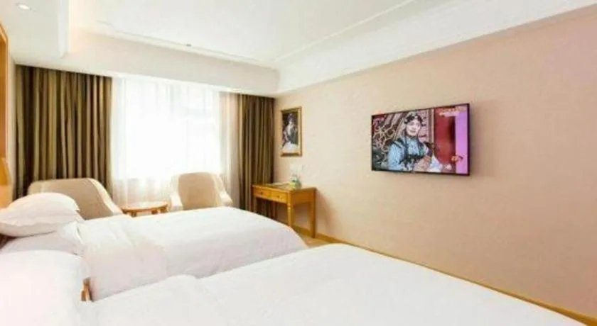 Bed in Vienna Hotel Changsha Wuyi Avenue Railway Station