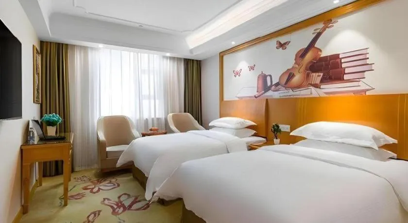 Bed in Vienna Hotel Changsha Wuyi Avenue Railway Station