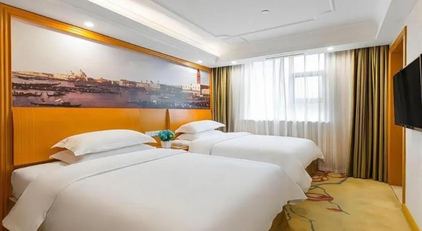 Bed in Vienna Hotel Changsha Wuyi Avenue Railway Station