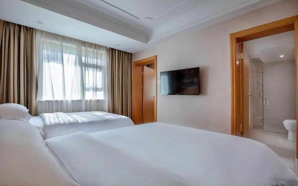 Bed in Vienna Hotel Changsha Wuyi Avenue Railway Station