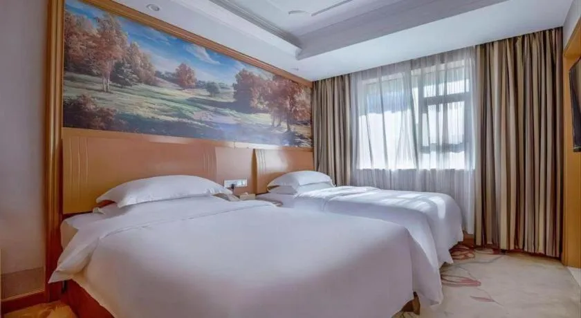 Bed in Vienna Hotel Changsha Wuyi Avenue Railway Station