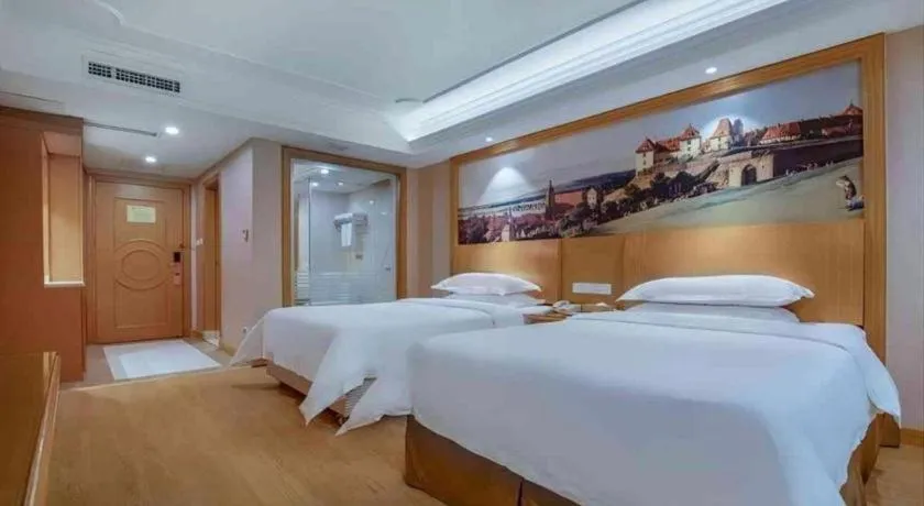 Bed in Vienna Hotel Changsha Wuyi Avenue Railway Station