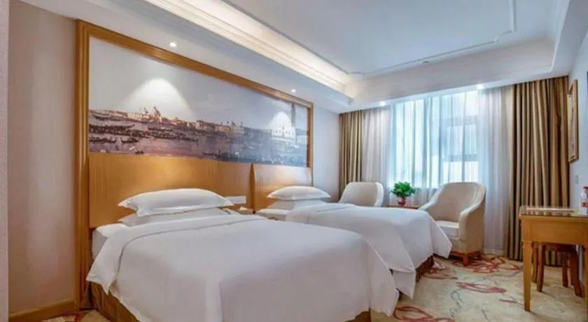 Bed in Vienna Hotel Changsha Wuyi Avenue Railway Station