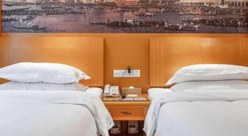 Bed in Vienna Hotel Changsha Wuyi Avenue Railway Station