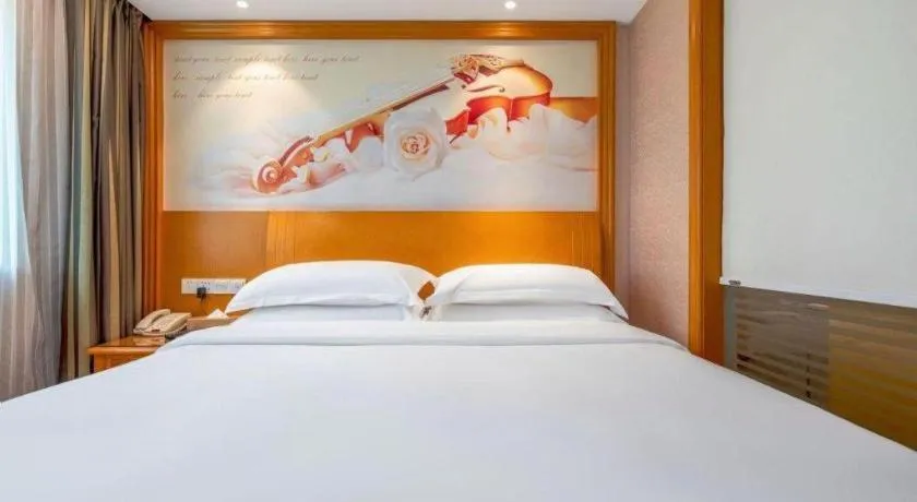 Bed in Vienna Hotel Changsha Wuyi Avenue Railway Station