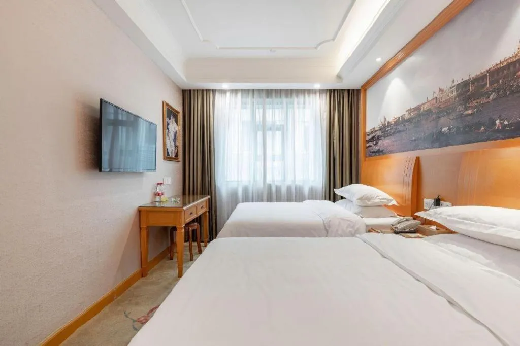 Bed in Vienna Hotel Changsha Wuyi Avenue Railway Station