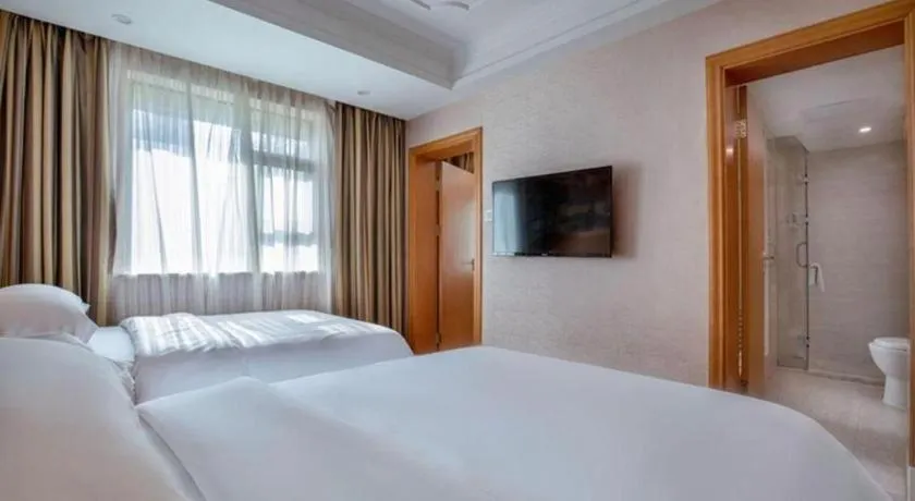 Bed in Vienna Hotel Changsha Wuyi Avenue Railway Station