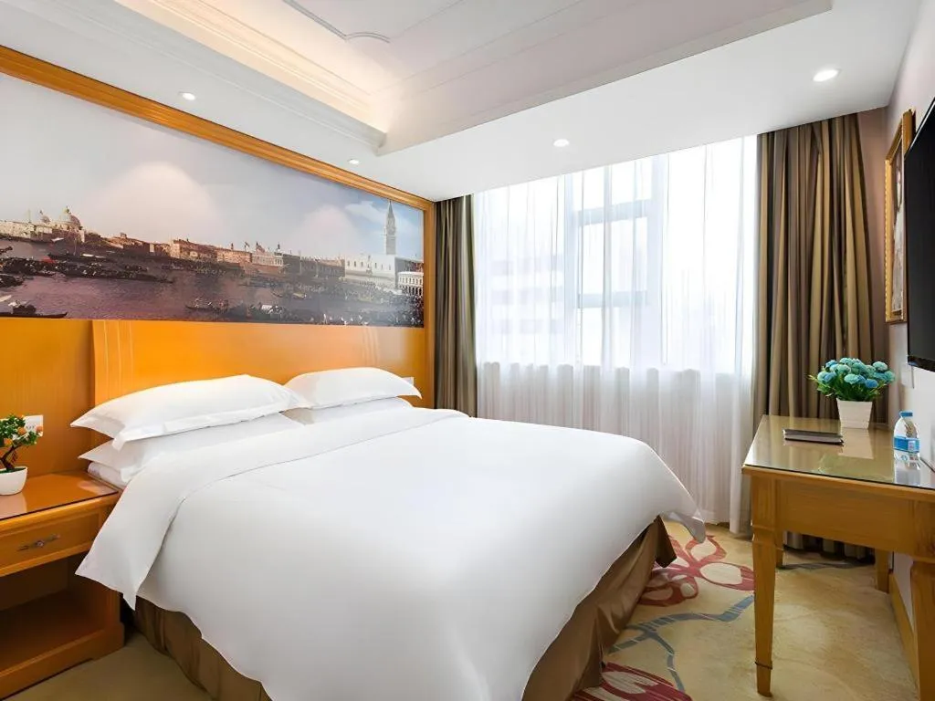 Bed in Vienna Hotel Changsha Wuyi Avenue Railway Station