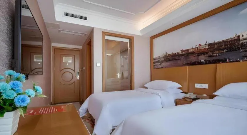 Bed in Vienna Hotel Changsha Wuyi Avenue Railway Station