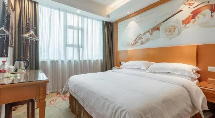 Bed in Vienna Hotel Changsha Wuyi Avenue Railway Station