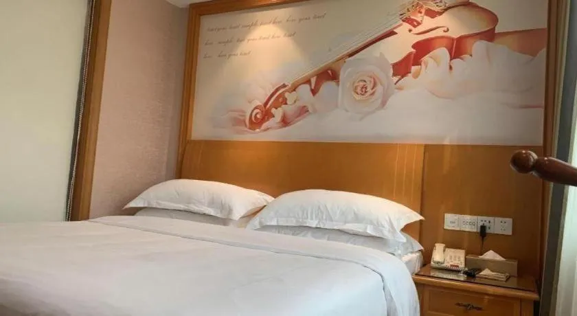 Bed in Vienna Hotel Changsha Wuyi Avenue Railway Station