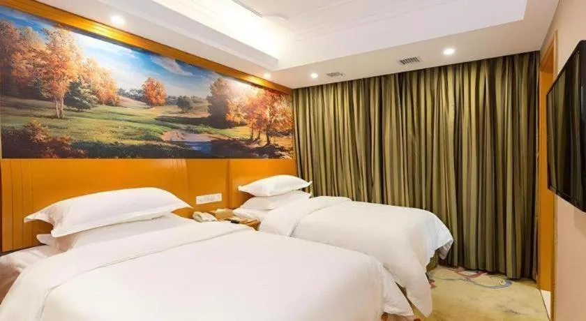 Bed in Vienna Hotel Changsha Wuyi Avenue Railway Station