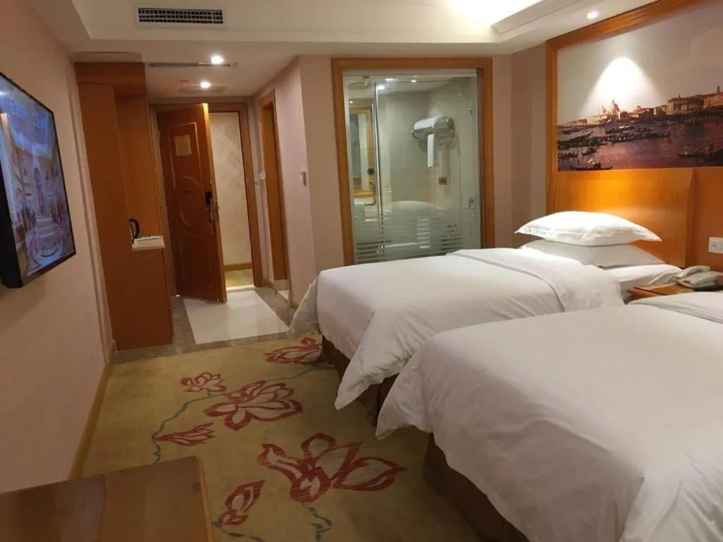 Bed in Vienna Hotel Changsha Wuyi Avenue Railway Station