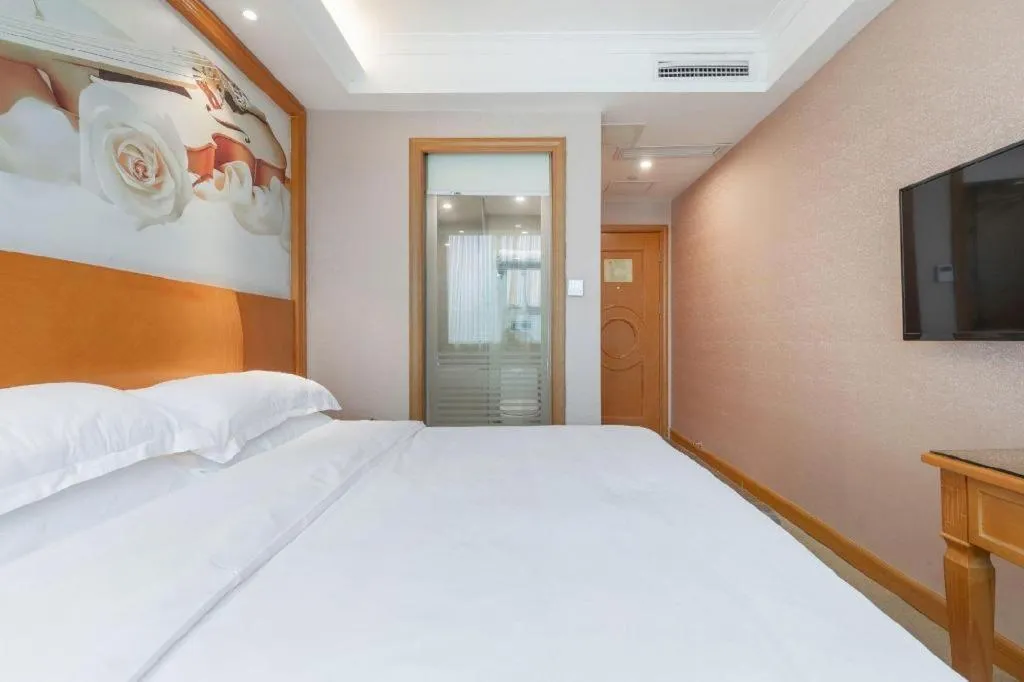 Bed in Vienna Hotel Changsha Wuyi Avenue Railway Station