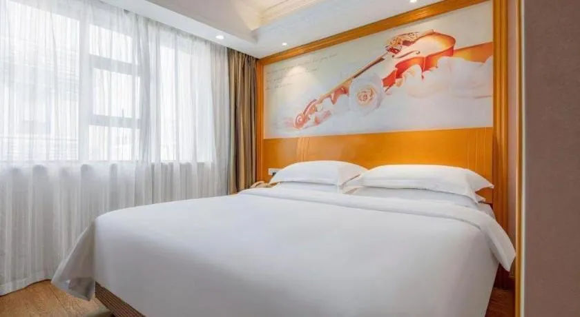 Bed in Vienna Hotel Changsha Wuyi Avenue Railway Station