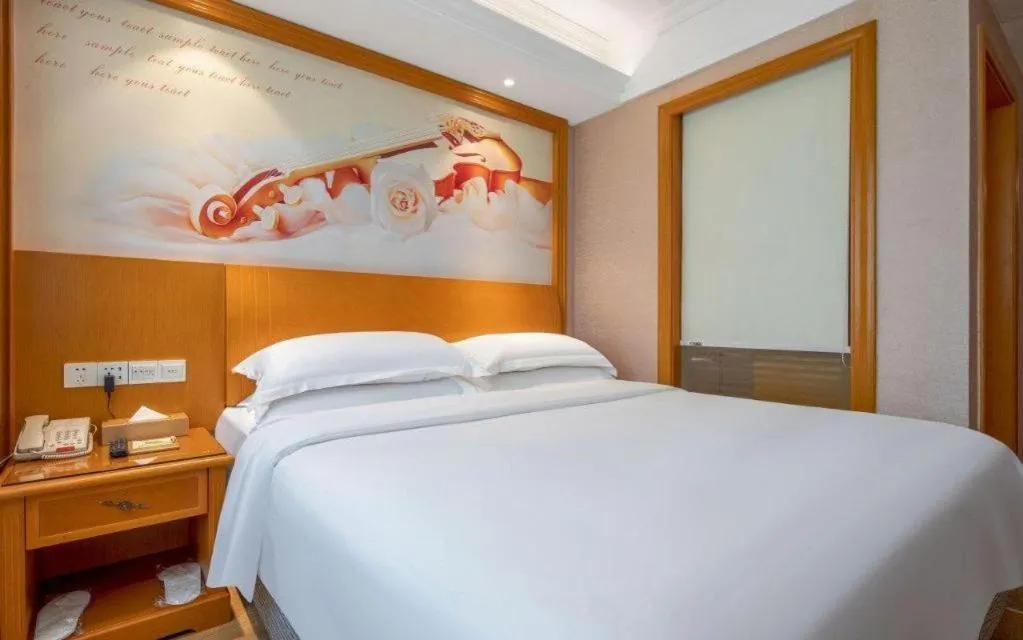 Bed in Vienna Hotel Changsha Wuyi Avenue Railway Station