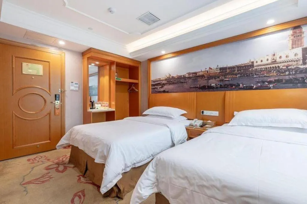 Bed in Vienna Hotel Changsha Wuyi Avenue Railway Station