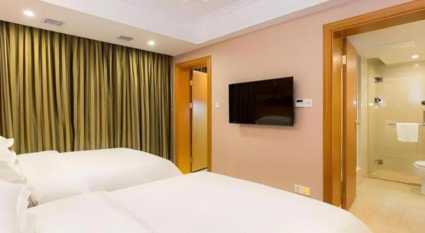 Bed in Vienna Hotel Changsha Wuyi Avenue Railway Station