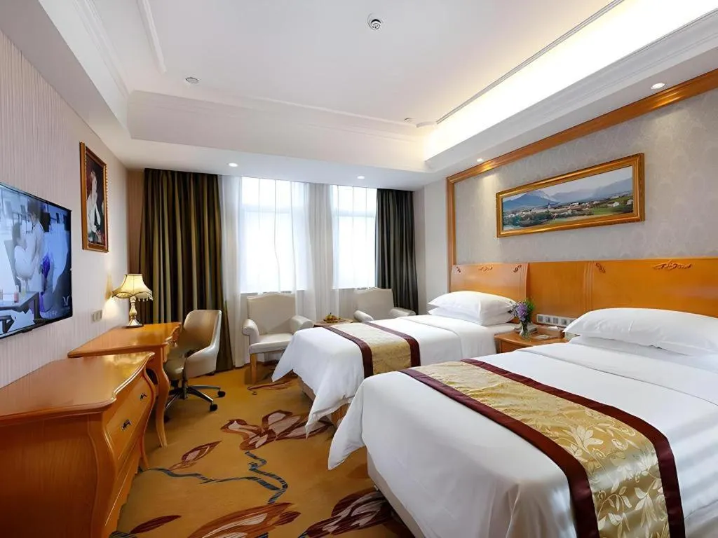 Bed in Vienna Hotel Chengdu Airport Shuangliu Wanda