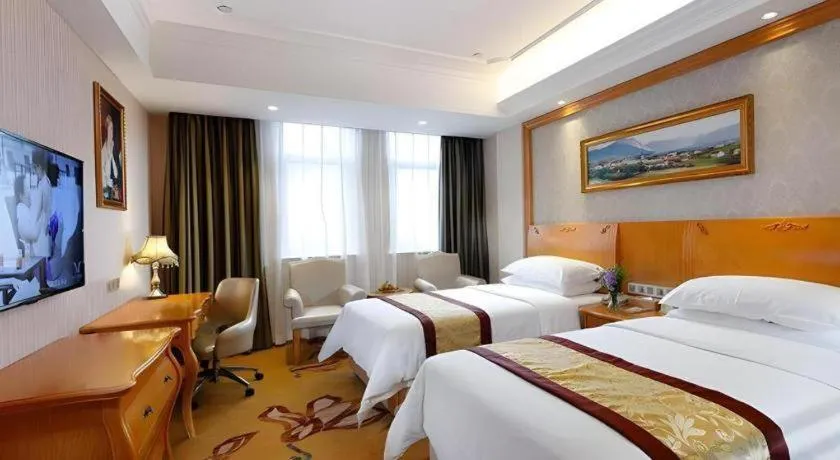 Bed in Vienna Hotel Chengdu Airport Shuangliu Wanda