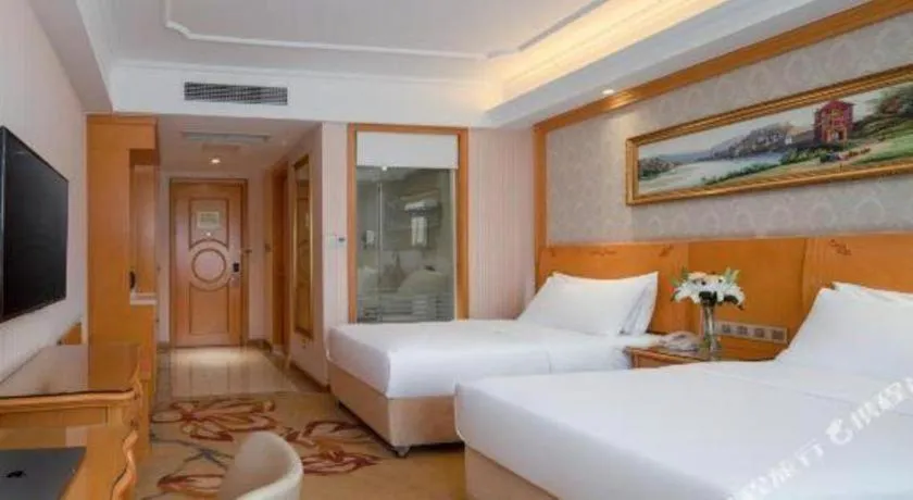 Bed in Vienna Hotel Chengdu Airport Shuangliu Wanda