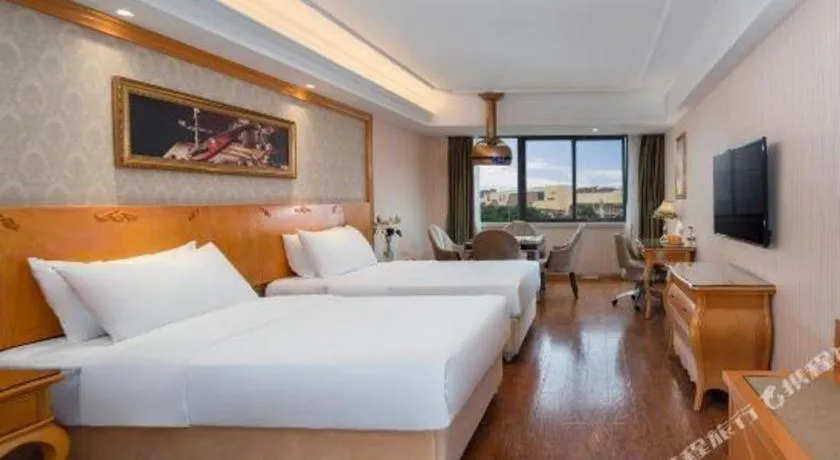 Bed in Vienna Hotel Chengdu Airport Shuangliu Wanda