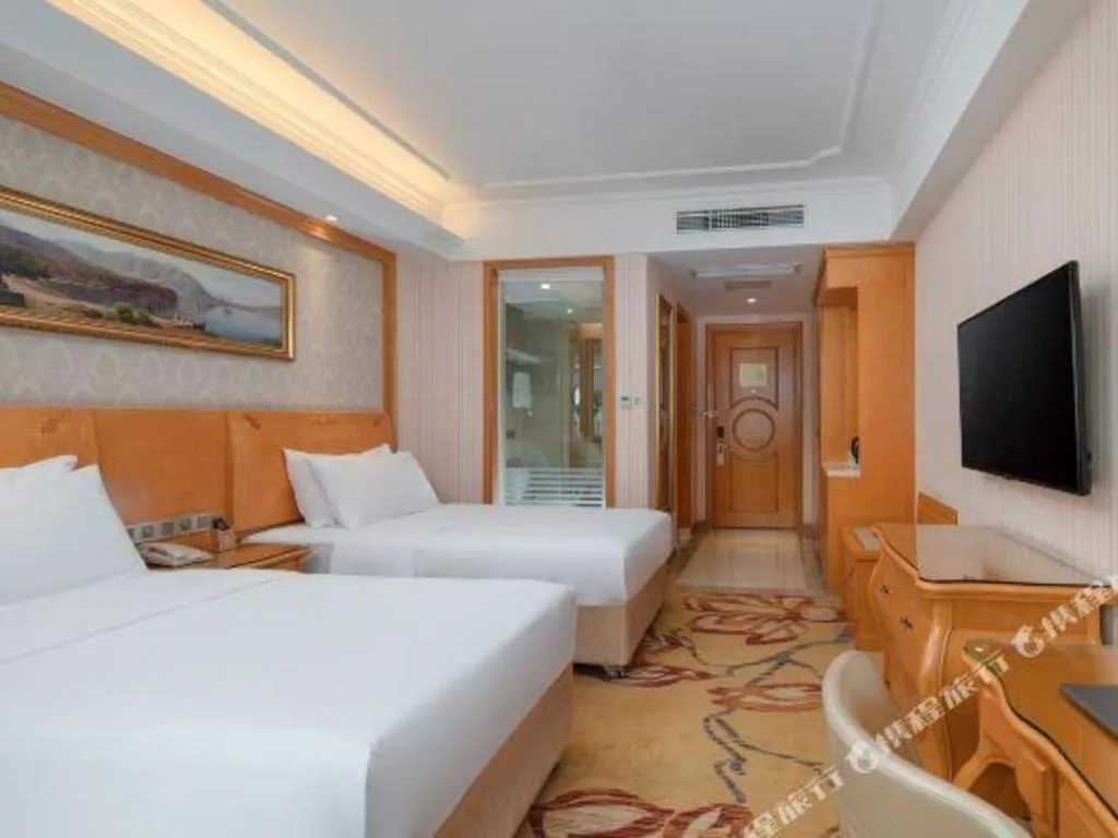 Bed in Vienna Hotel Chengdu Airport Shuangliu Wanda