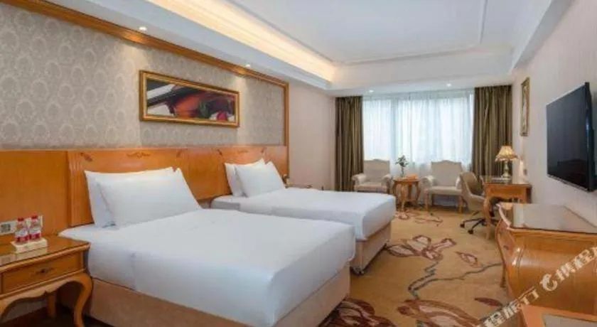 Bed in Vienna Hotel Chengdu Airport Shuangliu Wanda