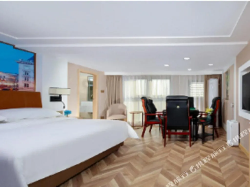 Bed in Vienna Hotel Chengdu Airport Shuangliu Wanda