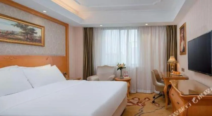 Bed in Vienna Hotel Chengdu Airport Shuangliu Wanda