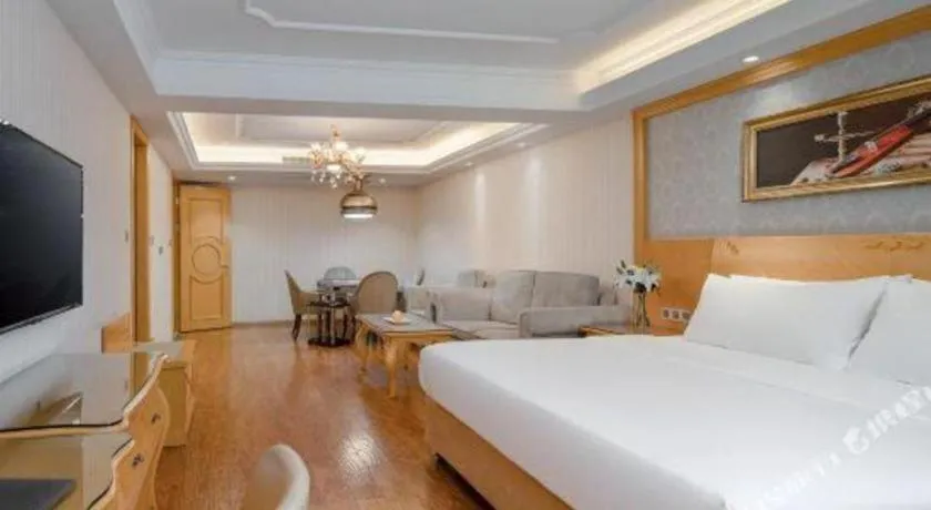 Bed in Vienna Hotel Chengdu Airport Shuangliu Wanda