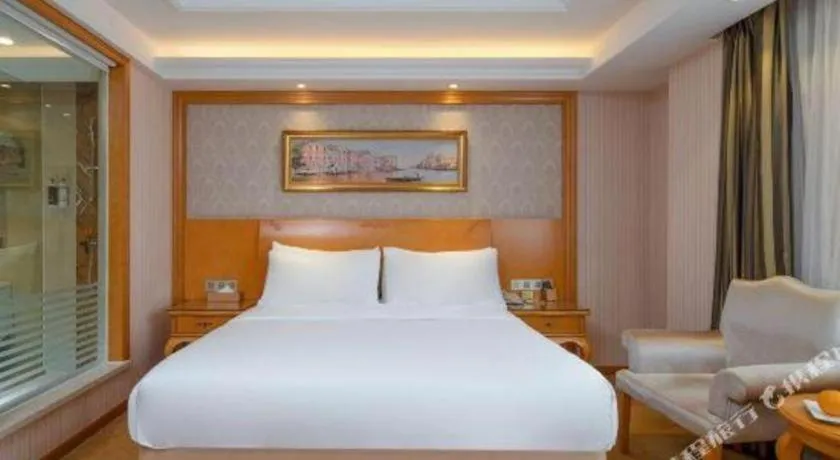 Bed in Vienna Hotel Chengdu Airport Shuangliu Wanda