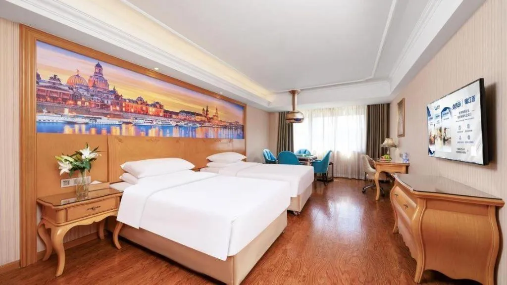 Bed in Vienna Hotel Chengdu Airport Shuangliu Wanda