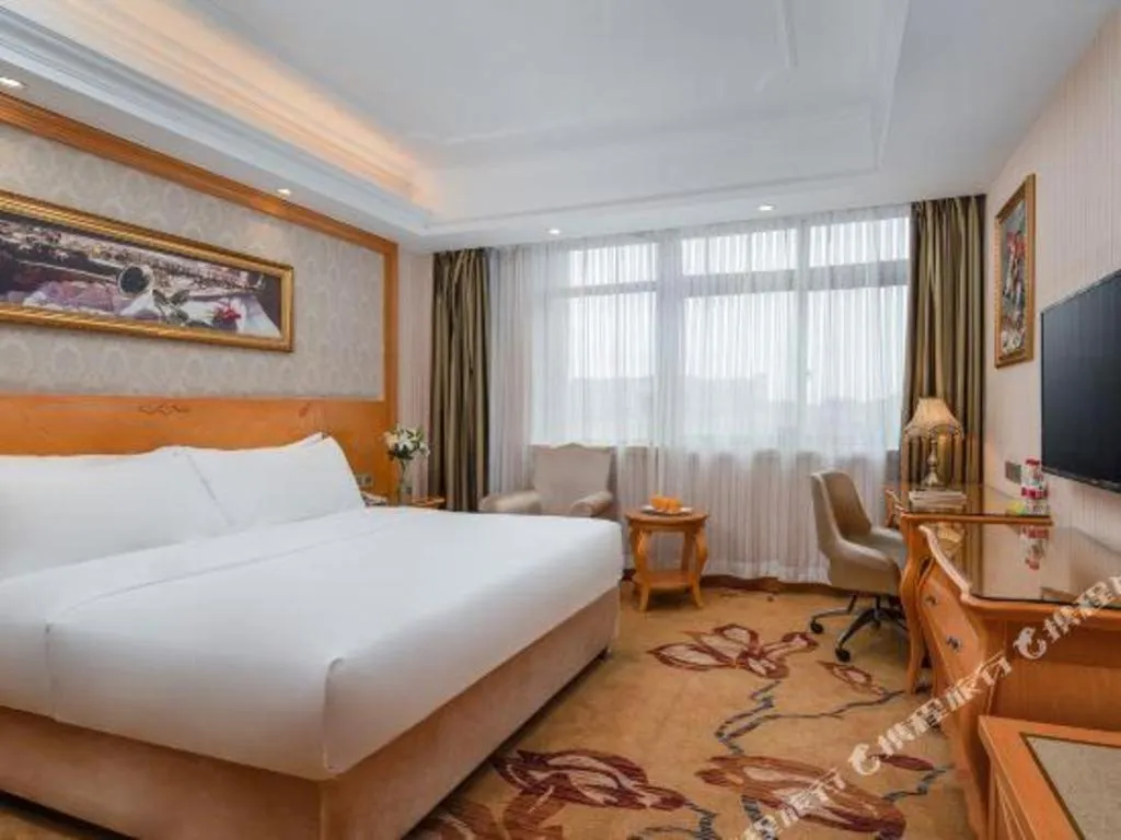 Bed in Vienna Hotel Chengdu Airport Shuangliu Wanda