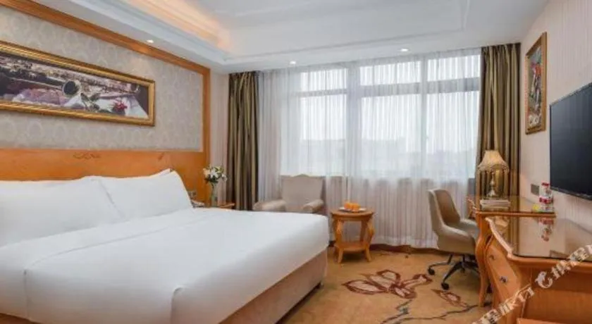 Bed in Vienna Hotel Chengdu Airport Shuangliu Wanda