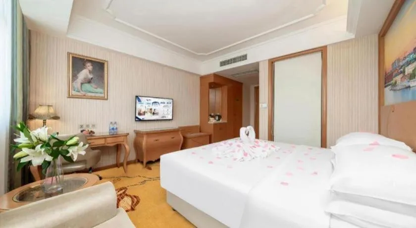 Bed in Vienna Hotel Chengdu Airport Shuangliu Wanda