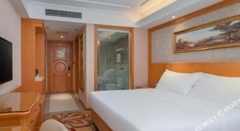 Bed in Vienna Hotel Chengdu Airport Shuangliu Wanda