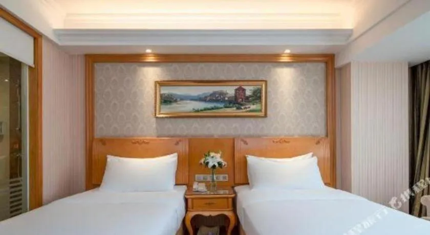 Bed in Vienna Hotel Chengdu Airport Shuangliu Wanda