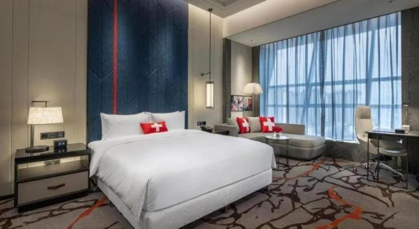 Bed in Swisstouches Hotel Ankang