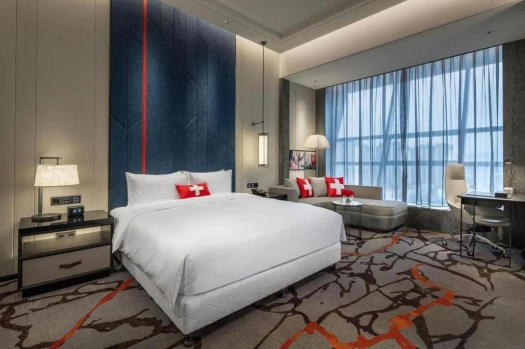 Bed in Swisstouches Hotel Ankang