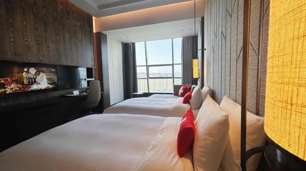 Bed in Swisstouches Hotel Ankang