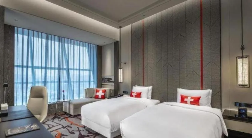 Bed in Swisstouches Hotel Ankang